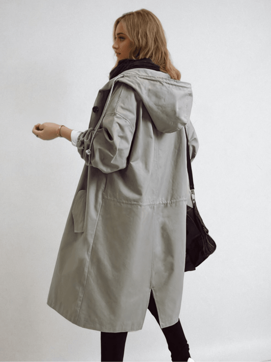 Trenchcoat long chic avec capuche réglable et silhouette moderne